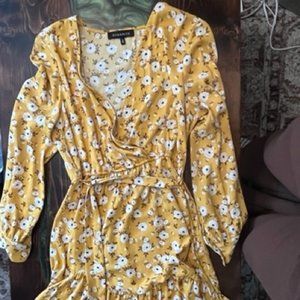 Yellow dynamite wrap dress